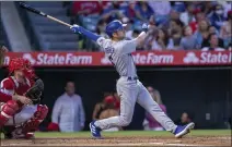  ?? ALEX GALLARDO – THE ASSOCIATED PRESS ?? The Dodgers' Trea Turner homers during the third inning Saturday night.