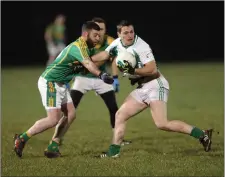  ??  ?? Alan Tutty on the ball for Donard-The Glen.