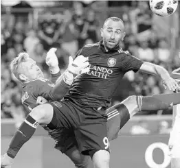  ?? STEPHEN M. DOWELL/STAFF PHOTOGRAPH­ER ?? Orlando City newcomer Justin Meram, right, assisted on the game-tying goal Saturday and said the team is focused on winning games “and it’s not by individual qualities.”