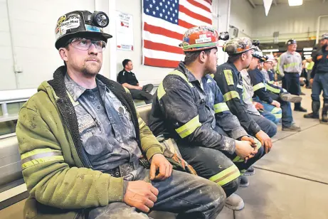  ??  ?? Coal miner Dale Travis, 53, of Wheeling, West Virginia, waits for the arrival of US Environmen­tal Protection Agency Administra­tor Scott Pruitt to visit with miners at the Harvey Mine on April 13 in Sycamore, Pennsylvan­ia. The Harvey Mine, owned by CNX...