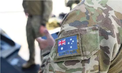  ?? Photograph: Ian Hitchcock/Getty Images ?? The Inspector General of the Australian Defence Force has been informed of allegation­s and harassment of officer cadets at the Sydney University regiment.