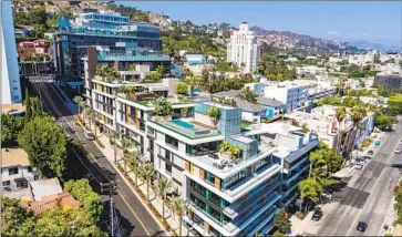  ?? Pendry Residences West Hollywood ?? THE PENTHOUSE at Pendry Residences West Hollywood has traded hands for $21.5 million, the priciest condo sale in Los Angeles County this year. The unit spans 6,300 square feet and boasts a wraparound terrace.
