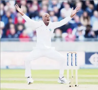  ?? (Photo courtesy of Cricket West Indies) ?? Off-spinner Roston Chase bellows an appeal. He ended with 2-7 from just 2.4 overs.