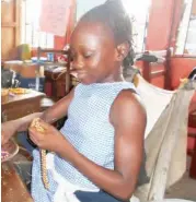  ??  ?? Teniola Ibitoye making beads in her class, on her wheel chair