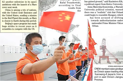  ?? DONGLIANG/XINHUA ?? CREW members wave goodbye as China’s space tracking ship
Yuanwang-6 departs from a port in east China’s Jiangsu Province.