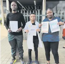  ?? PHOTO: NQUBEKO MBHELE ?? FROM LEFT: Unemployed pharmacist­s Sandile Nzuza, Nkalipho Ndlovu and Sinethemba Dlamini outside the Natalia building in their quest for jobs from the Department of Health yesterday.