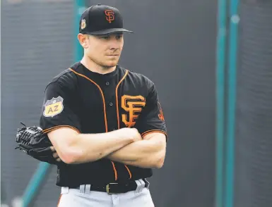  ?? Chris Carlson / Associated Press ?? Closer Mark Melancon has pitched in 11 games for the Giants, totaling 102⁄3 innings, since signing a four-year, $62 million contract in December. He has a 2.53 ERA and six saves in eight chances.