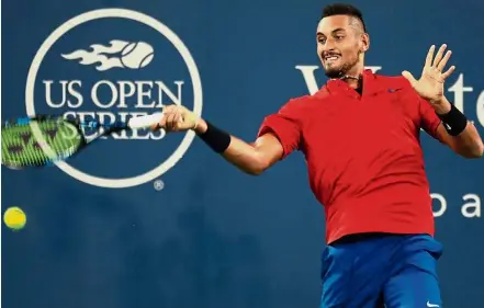  ??  ?? Game for a long rally: Australia’s Nick Kyrgios in action against Spain’s David Ferrer in the Cincinnati Open semi-finals in Ohio on Saturday. Kyrgios won 7- 6 (7-3), 7- 6 (7-4). — AFP