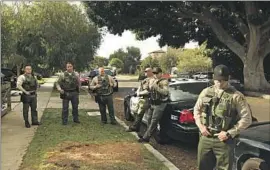  ?? Genaro Molina Los Angeles Times ?? DEPUTIES at the home of Patti Giggans during the search. Giggans is Kuehl’s appointee on the Civilian Oversight Commission, a watchdog on the sheriff.