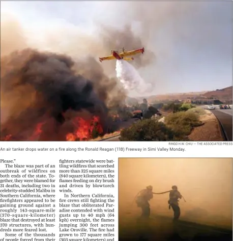  ?? RINGO H.W. CHIU — THE ASSOCIATED PRESS ?? An air tanker drops water on a fire along the Ronald Reagan (118) Freeway in Simi Valley Monday.