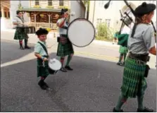  ?? LISA MITCHELL — DIGITAL FIRST MEDIA ?? Hawk Mountain Highlander­s performed in the Kutztown University 150th Anniversar­y Parade.