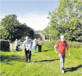  ??  ?? Walking On Sunshine
The walking group stride out