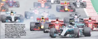  ??  ?? Mercedes’ Finnish driver Valtteri Bottas (1st-right) drives after the start of the Formula One Austria Grand Prix at the Red Bull Ring in Spielberg, Austria on Sunday. –