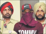  ?? HT PHOTO ?? The accused in police custody in Amritsar on Wednesday.