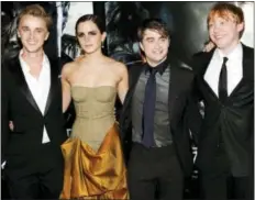  ??  ?? In this 2011 photo, from left, Tom Felton, Emma Watson, Daniel Radcliffe and Rupert Grint pose at the premiere of “Harry Potter and the Deathly Hallows: Part 2” in New York.