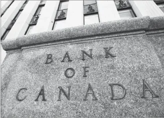  ?? CP PHOTO ?? The Bank of Canada is seen in Ottawa earlier this year. The Bank of Canada raised its benchmark interest rate Wednesday to 1.5 per cent.