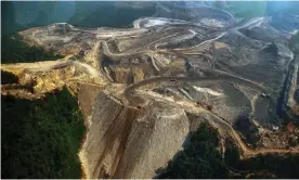  ?? ?? Mountainto­p-removal coal mining in West Virginia. Photograph: Mandel Ngan/AFP/