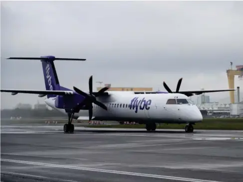  ?? ?? F l ybe’s first operation between Birmingham and Be l fast in Apri l l ast year (Flybe)