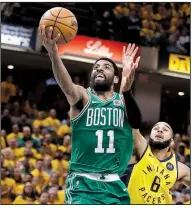  ?? AP/DARRON CUMMINGS ?? Kyrie Irving (11) had 19 points and 10 rebounds in the Boston Celtics’ victory over the Indiana Pacers in Game 3 of their NBA playoff series Friday in Indianapol­is. Boston leads the series 3-0.