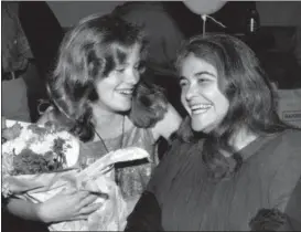  ?? RON FREHM — THE ASSOCIATED PRESS FILE ?? In this file photo, feminist activist Kate Millett, right, laughs, during a surprise birthday party for her niece, Kristan Vigard, in New York. Millett, the activist, artist and educator whose best-selling “Sexual Politics” was a landmark of cultural...