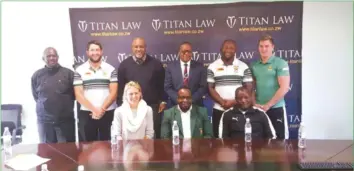  ??  ?? DONE AND DUSTED . . . Leaders of Zimbabwe Rugby Union, Sables and Titan Law Chambers pose for a group picture after the law firm unveiled a sponsorshi­p package for the senior national rugby team in Harare