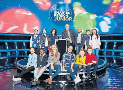  ?? CBC ?? Host Paul Sun-Hyung Lee of Kim’s Convenienc­e with the cast of Canada’s Smartest Person Junior.