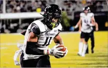  ?? JOHN RAOUX / AP 2020 ?? Cincinnati tight end Leonard Taylor of Springfiel­d has played 35 games in three years and caught 23 passes for 259 yards and two touchdowns. He also had two tackles last season.