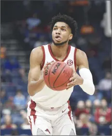  ?? Charlie Kaijo/NWA Democrat-Gazette ?? Back in the draft: Arkansas guard Isaiah Joe (1) shoots, Wednesday, March 11, 2020, during a basketball game at Bridgeston­e Arena in Nashville, Tenn. On Monday, Joe elected to re-enter the NBA Draft.