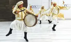  ?? Atiq Ur Rehman /Gulf News ?? An energetic rendition of a traditiona­l Lebanese dance captivated grooms and guests alike.