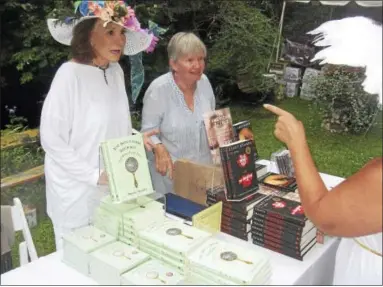  ?? JOHN TORSIELLO PHOTO ?? Author Sheila Nevins, left, signs books for her fans at the Tea for Two Hundred event.
