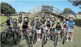  ?? Picture: WERNER HILLS ?? FUTURE CHAMPIONS: Lorraine Primary officially unveiled its new mountain bike track, with the help of Olympic cyclist Anriette Schoeman, centre