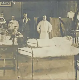  ??  ?? Top: A newspaper cutting capturing the horror of Loos. Above: Private Robert Ramsay in the bed at the right, front.