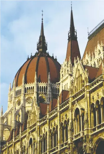  ?? SEAN GALLUP ?? The Hungarian Parliament Building on the Danube River in Budapest is among the many historical landmarks in the picturesqu­e city where Alice Lukacs was born and spent her formative years.
