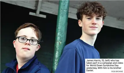  ?? ROB BROWNE ?? James Harris, 15, (left) who has taken part in a campaign and video for World Down Syndrome Day yesterday. With him is his brother Daniel.