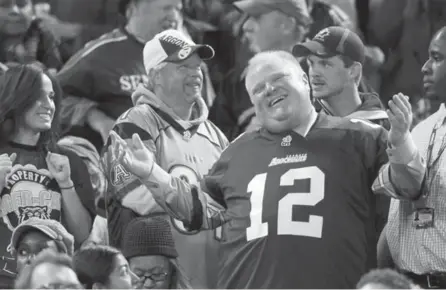  ?? REUTERS FILE PHOTO ?? Mayor Rob Ford sparked a commotion among fans when he showed up for part of the CFL Eastern Final game at the Rogers Centre in November.