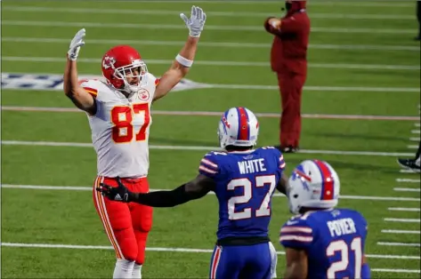  ?? AP Photo/Jeffrey T. Barnes ?? Kansas City Chiefs’ Travis Kelce (left) celebrates his touchdown during the first half of an NFL football game against the Buffalo Bills, on Monday in Orchard Park, N.Y.