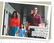  ??  ?? Khana and Kumar with their kids Nitara and Aarav Kumar (behind).