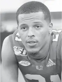  ?? WILFREDO LEE/AP ?? Miami safety Bubba Bolden speaks to members of the media Tuesday during the team’s Media Day.