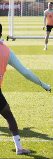  ?? ?? Greg Taylor (centre) in training at Lennoxtown alongside his captain Callum McGregor (left) as they prepare for the run-in