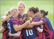  ?? Sofie Brandt/The Hartford Courant ?? Members of the U.S. women’s soccer team embrace after Lindsey Horan’s goal in the first half against Mexico.