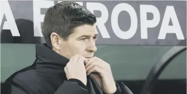  ??  ?? 0 Rangers manager Steven Gerrard watches anxiously as his side battled in vain in Vienna.