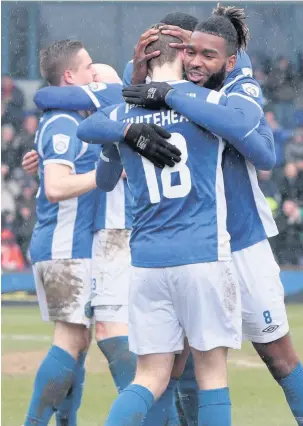  ?? David Tolliday ?? Danny Whitehead celebrates with Tyrone Marsh