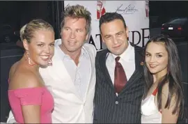  ?? Jean-Paul Aussenard WireImage ?? WRITER-DIRECTOR Reverge Anselmo, third from left, with “Stateside” actors Agnes Bruckner, Val Kilmer and Rachael Leigh Cook in May 2004.