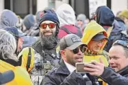  ?? Anthony Crider/For The Washington Post ?? Proud Boy Jeremy Bertino, wearing a beard, sunglasses and knit hat, attends a rally in Richmond, Va., in January 2020. Proud Boys leader Henry “Enrique” Tarrio is wearing sunglasses and a cap.