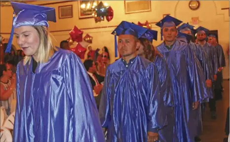  ??  ?? Graduation procession at the S.E.R. Jobs for Progress, Inc. ceremony, Friday at Hidalgo Hall in Brawley.