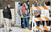  ?? JEFF CHIU/AP ?? Workers wait to be escorted into a YouTube office building Wednesday, a day after the shooting in San Bruno, Calif.