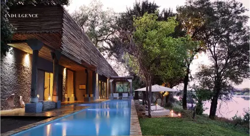  ??  ?? FROM TOP: THE SPA, COMMUNAL POOL AND WINE CELLAR AT MATETSI VICTORIA FALLS OVERLOOK THE ZAMBEZI RIVER; EACH LODGE HAS A STAND-ALONE TUB; THE MAVROS FAMILY; ELEPHANTS BY THE WATERHOLE AT DUSK. OPPOSITE PAGE: THE RIVER LODGE AT MATETSI VICTORIA FALLS