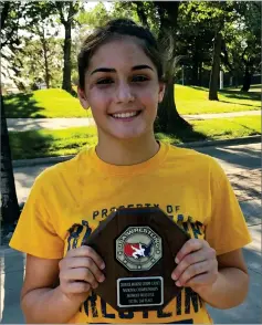  ?? CONTRIBUTE­D PHOTO BY TINA KOUYOUMTJI­AN ?? Monache High School’s Charlotte Kouyoumtji­an placed second in the women’s freestyle 112-pound weight class division of the US Marine Corps Cadet National Championsh­ips on Sunday, July 15, in Fargo, North Dakota.