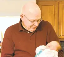  ?? OFJANET KELLER ?? Photo was taken on Thanksgivi­ng 2018. Clyde Keller of Newport News is holding his one-day-old great-grandson, James Camden Godwin. COURTESY