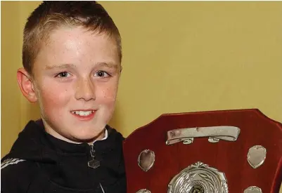  ??  ?? Jake Mc Donnell who was presented with the Best Overall Athlete of the Year Award at the Dunleer A.C. Awards night in The Travellers Rest, Hunterstow­n.